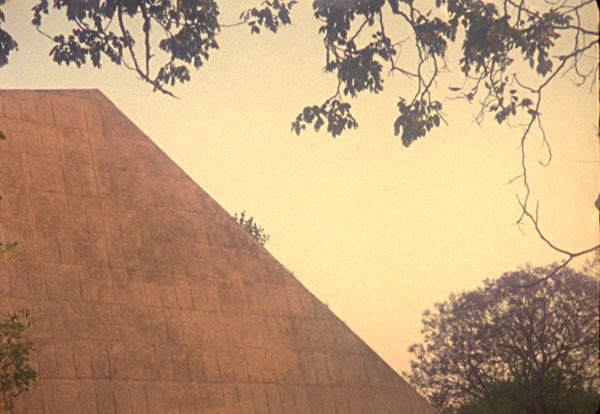 Chandigarh Bolex 16 mm video still Le Corbusier Jeanneret concrete building pyramid