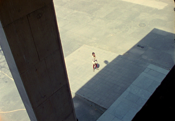 Chandigarh Bolex 16 mm video still Le Corbusier Jeanneret concrete building girl